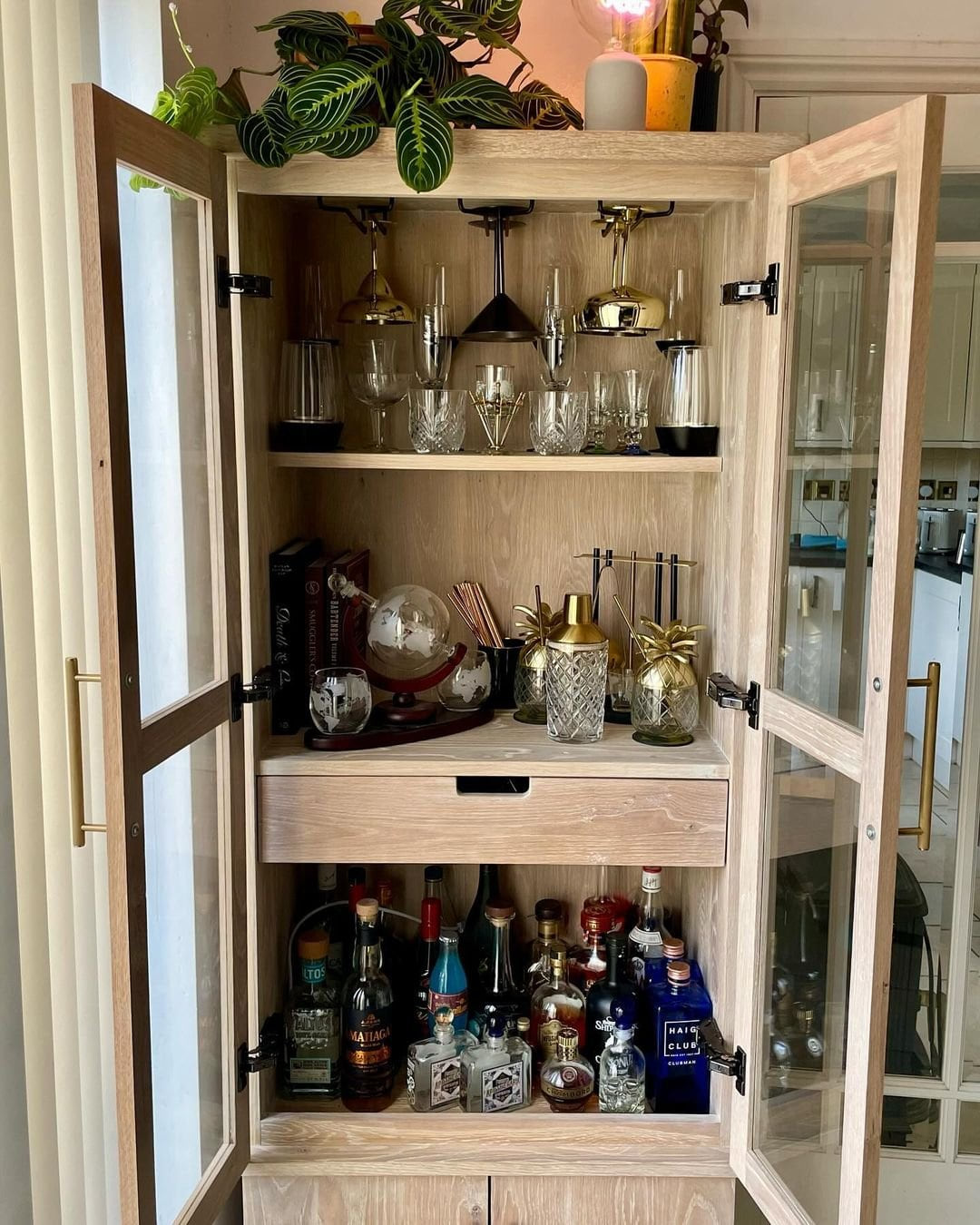 American white oak bar cabinet with glass shaker doors, handmade in Staffordshire